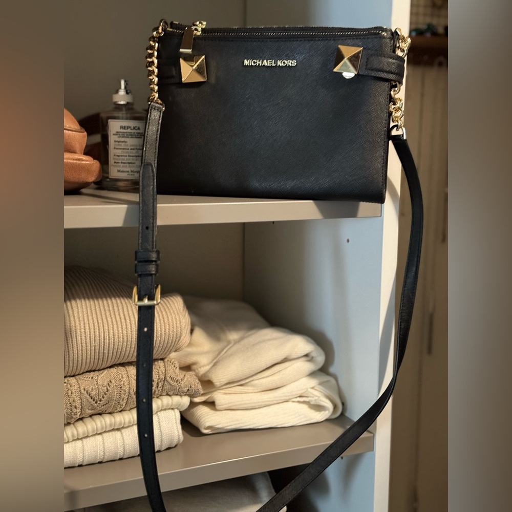 Michael Kors Jet Set Clutch in Black and Gold